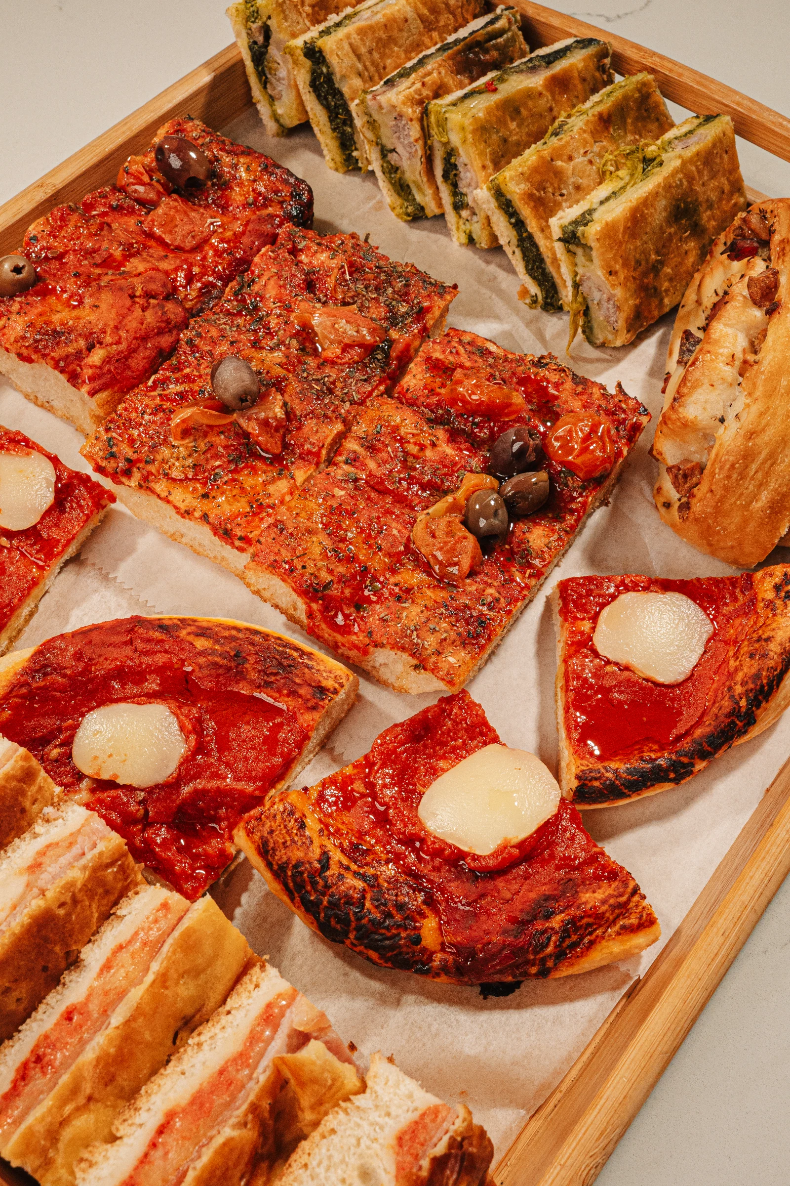 Surtido de pizza al taglio para catering — Pistacchio, Miami
