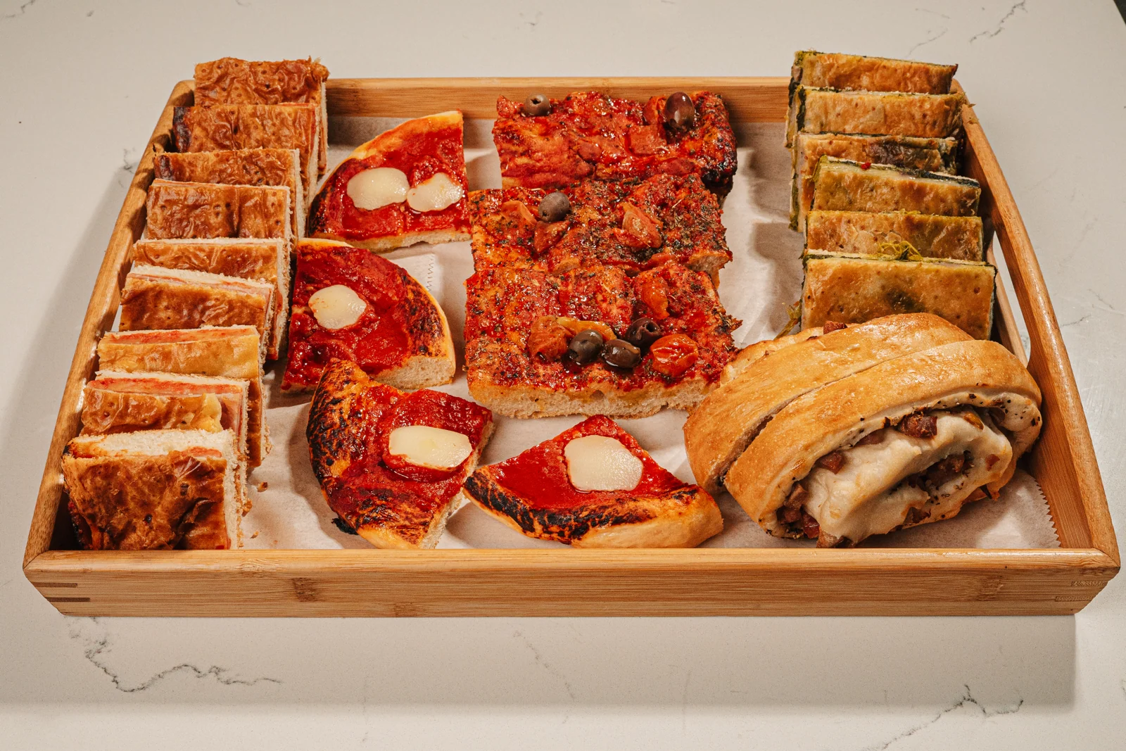 Bandeja de pizza al taglio para catering — Pistacchio, Miami